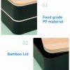 High quality japanese custom lunch box made from food-grade PP material with a natural bamboo lid for eco-friendly and safe meal storage